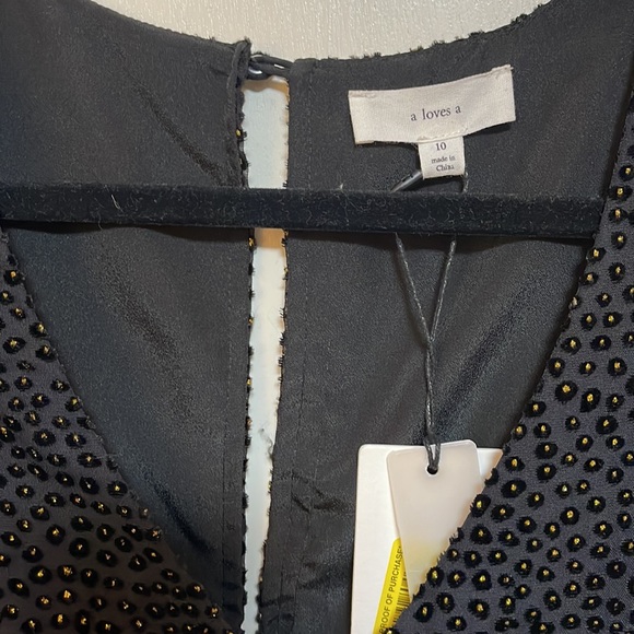 A Loves A Black Dress - Picture 2 of 9